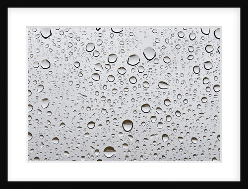 Water droplets on glass by Assaf Frank